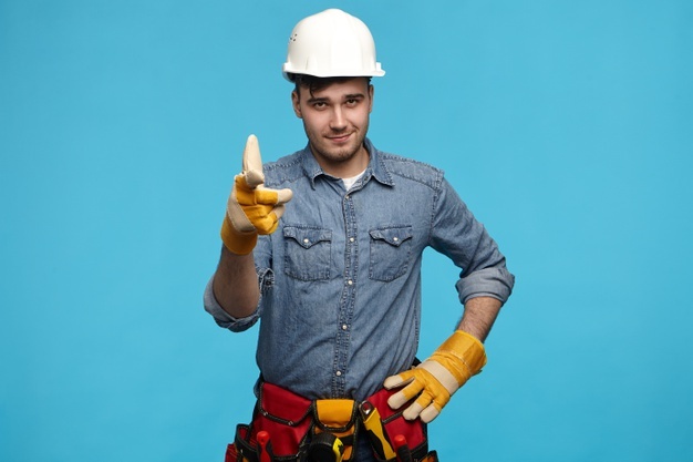 horizontal-shot-handsome-young-maintenance-service-worker-wearing-white-helmet_343059-3521