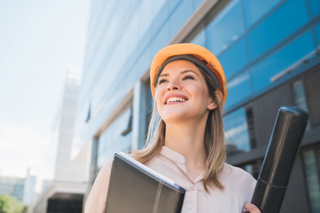 portrait-professional-architect-woman-wearing-yellow-helmet-standing-outdoors-engineer-architect-concept_58466-11853